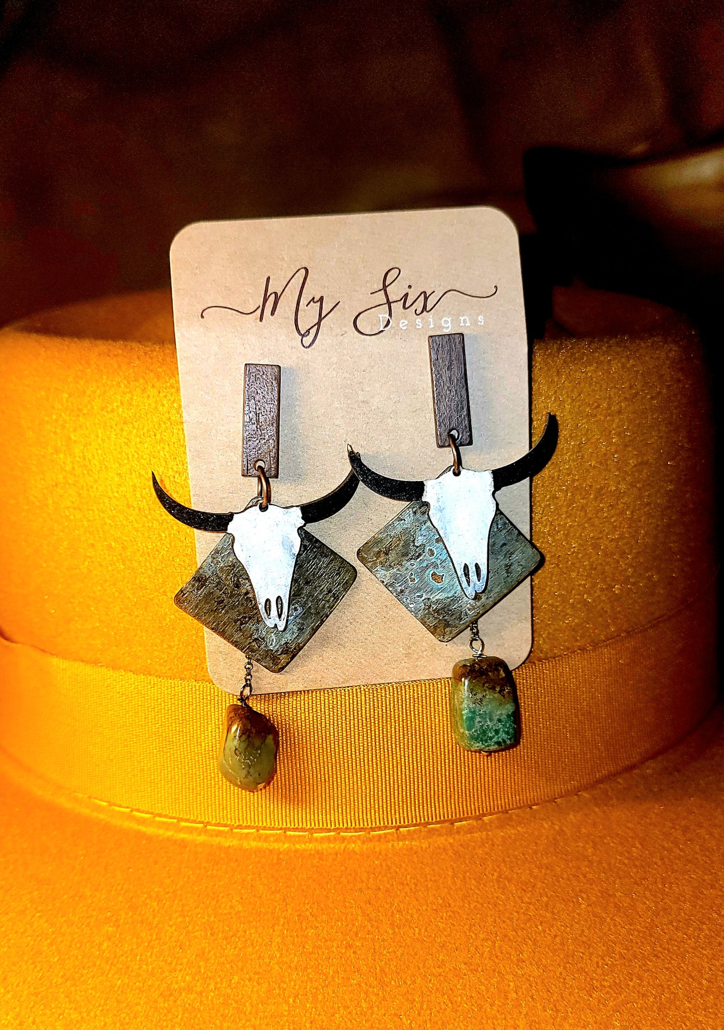 Earrings - Studs with Hand pained Wood Bull. Patina Brass and Turquoise accents.